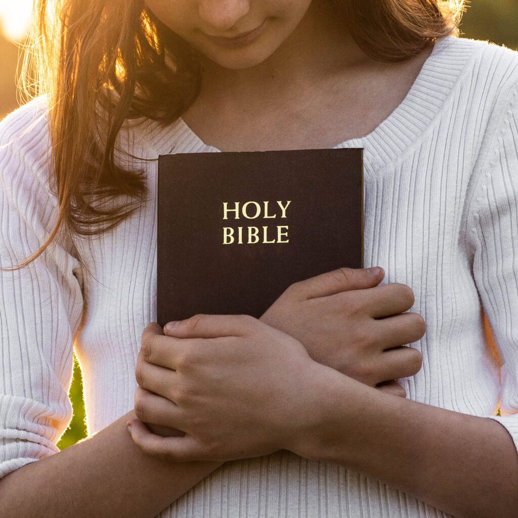 holding Bible